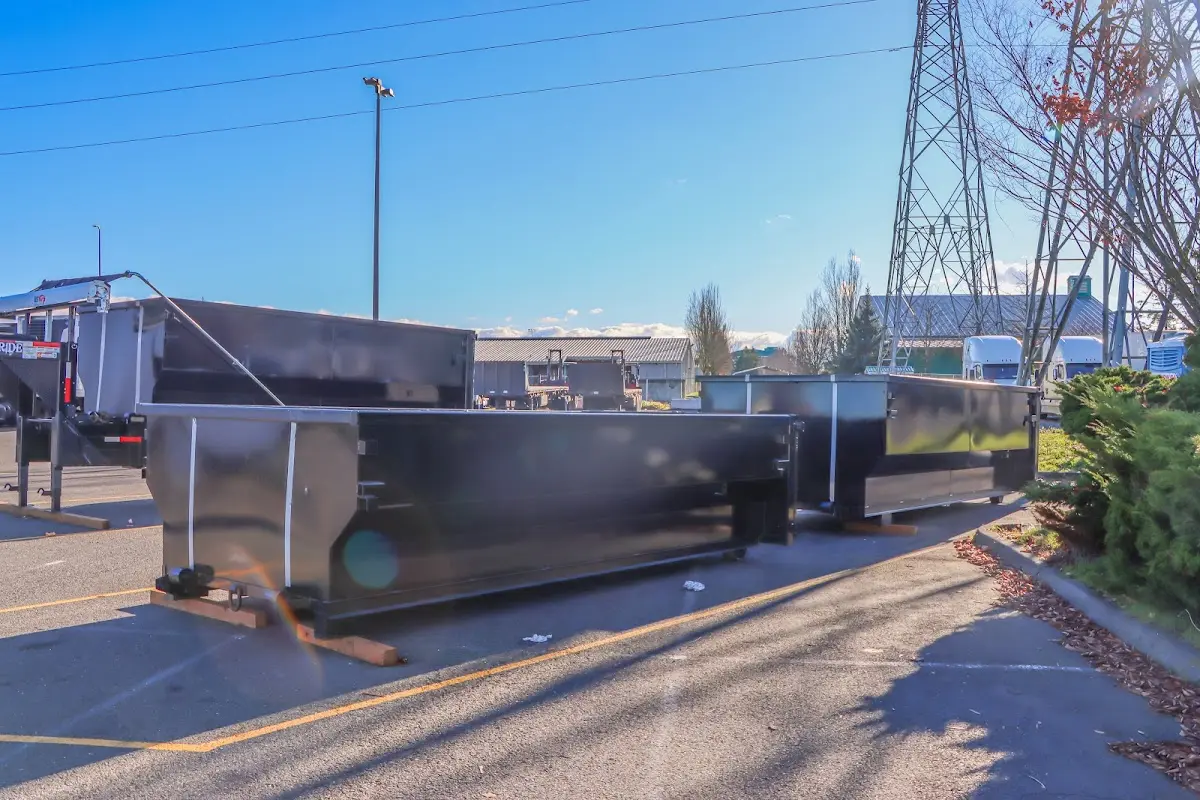 Roll-off dumpster ready for waste disposal at job site for Yard Waste Dumpster Rental in Columbia